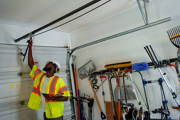 Professional Garage Door Spring Repair technician working in East Lansing, MI